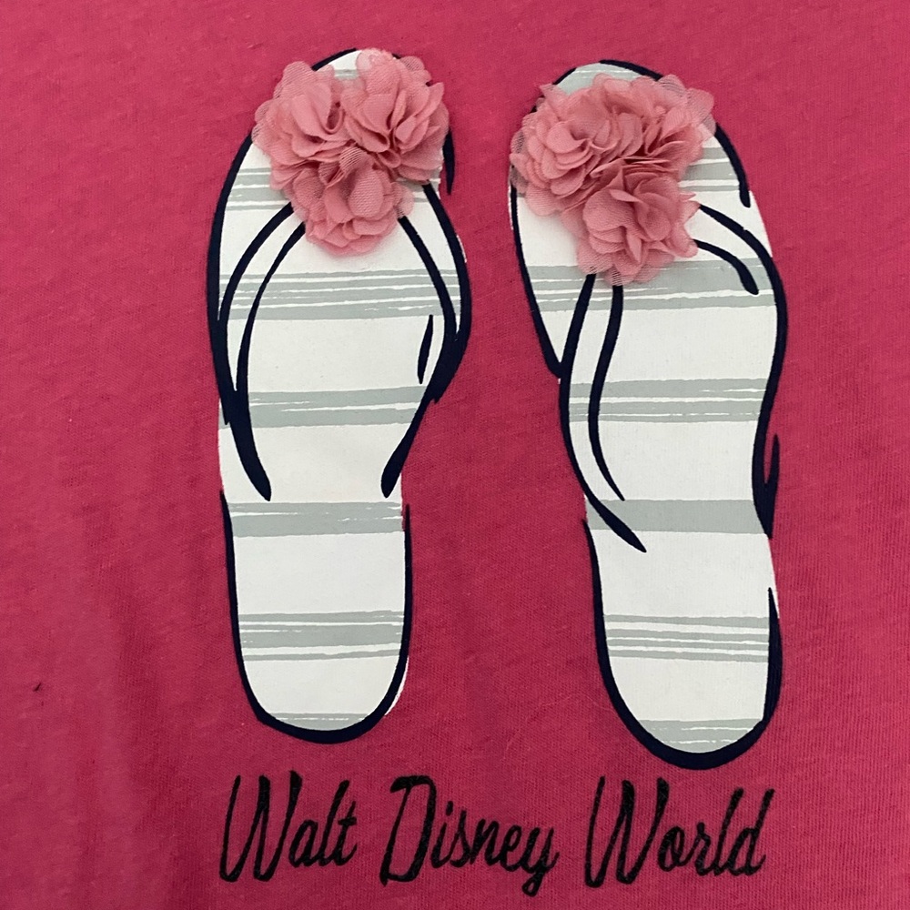 Disney Parks pink shirt with flip flops flower design. Size M. Walt Disney World